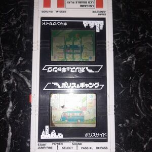 LSI BANDAI ELECTRONICS LCD DOUBLE PLAY POLICE & GANG MADE IN JAPAN 1984